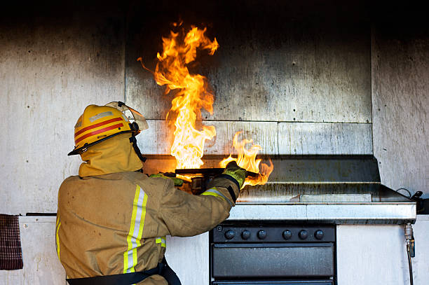 Chopping board vs fire stock photo