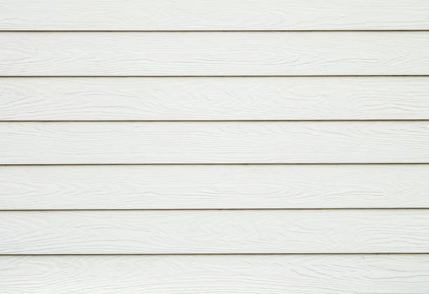 istock Closeup surface old wood board at the wall texture background 949315314