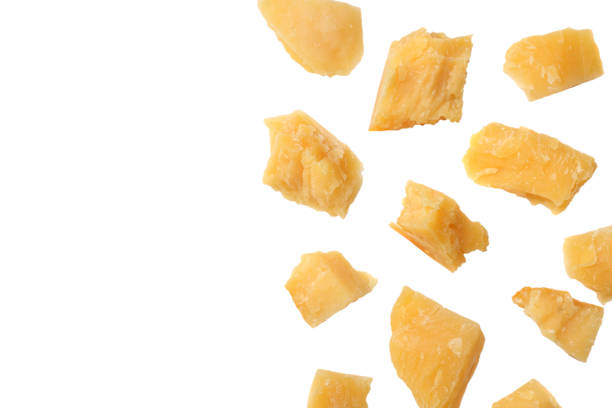 istock parmesan cheese isolated on a white background top view 949321568