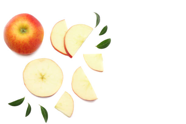 istock red apples with slices isolated on white background. top view 949321588