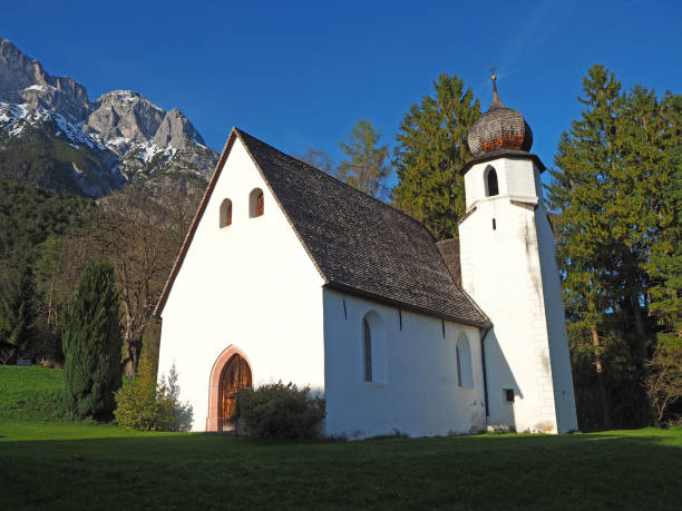 istock Traditional Austrian church in mountain environment 949321798