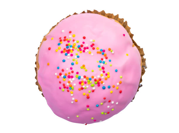 top view of pink chocolate coated bun cupcake isolated on white background