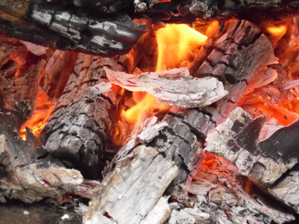 istock Flames smoke and hot coals of fire. 949333092
