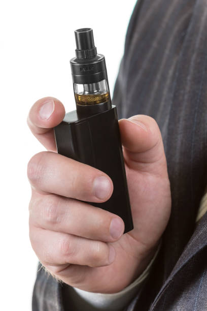 istock Electronic cigarette in man hand isolated on white 949341854