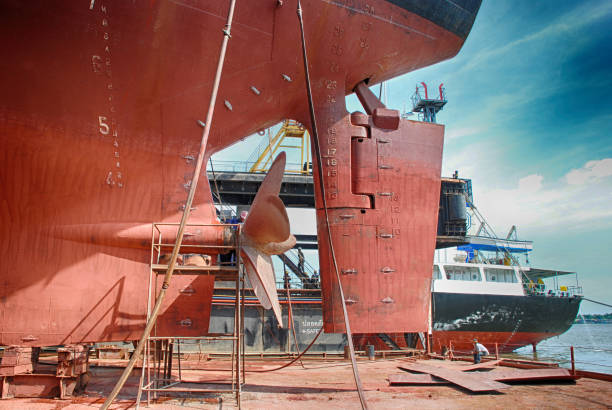 A Cargo Ship in Dry Dock A Cargo Ship in Dry Dock dry dock stock pictures, royalty-free photos & images