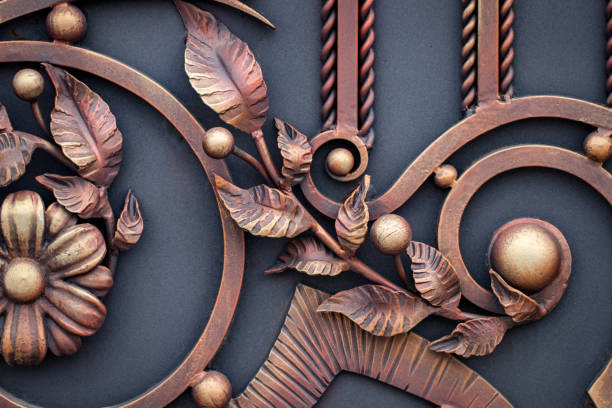 istock wrought-iron gates, ornamental forging, forged elements close-up 949343188