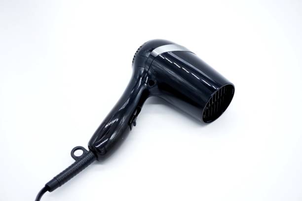 черный электрический фен - hair dryer single object plastic black стоковые фото и изображения