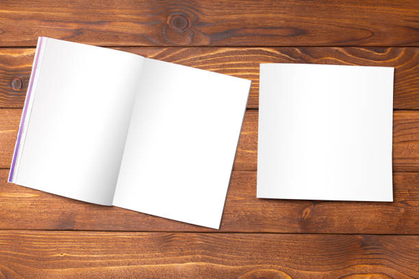 istock Blank book or magazine cover on wood background 949350600