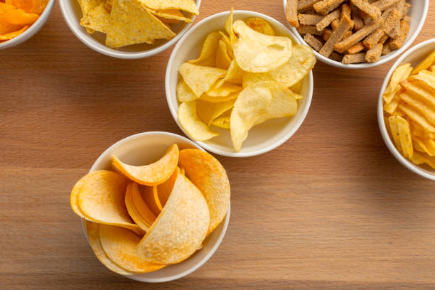 istock Pretzels in bowls on wooden table from above 949351220