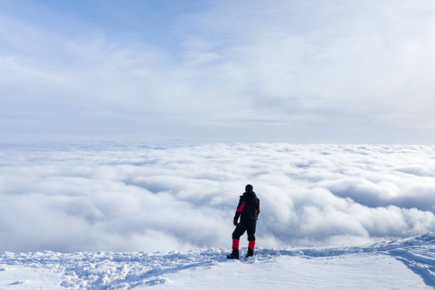 istock A man admiring the majestic mountain view 949351412