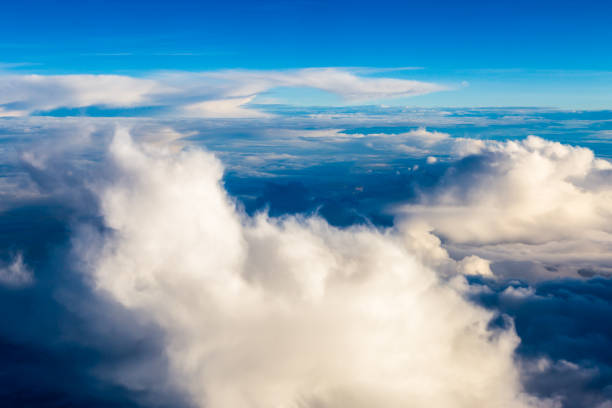 istock blue sky with the clouds from the plane view 949352188