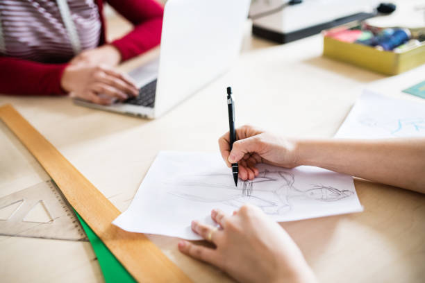 istock Young creative women in a studio, startup business. 949352936