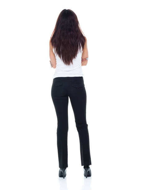 White trousers floating in mid air on white background in monochrome and minimalism. Illustration of the concept of fashion, textile industry and garment retailers