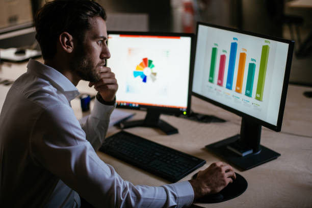 istock Businessman in the office doing research 949355606