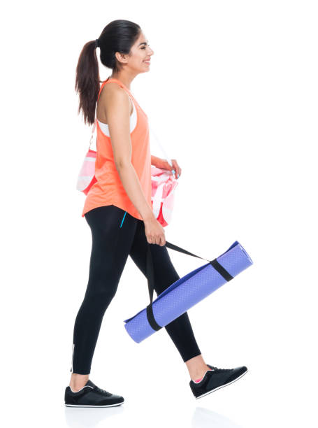 Woman In Exercise Clothes Walking Stock Photo - Download Image Now -  Walking, One Woman Only, Women - iStock