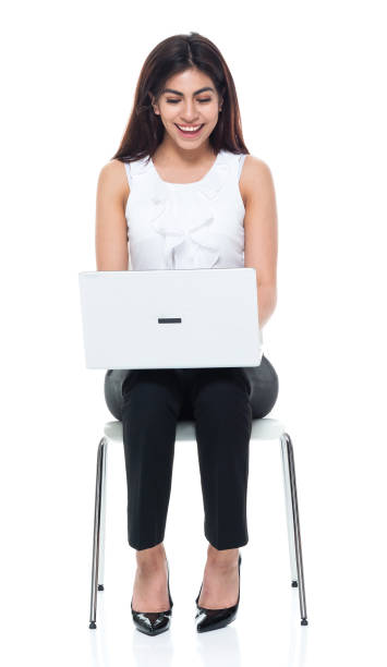 istock Businesswoman seated and using laptop 949355854