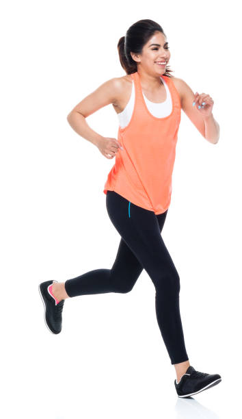istock Woman in exercise clothes running 949359738