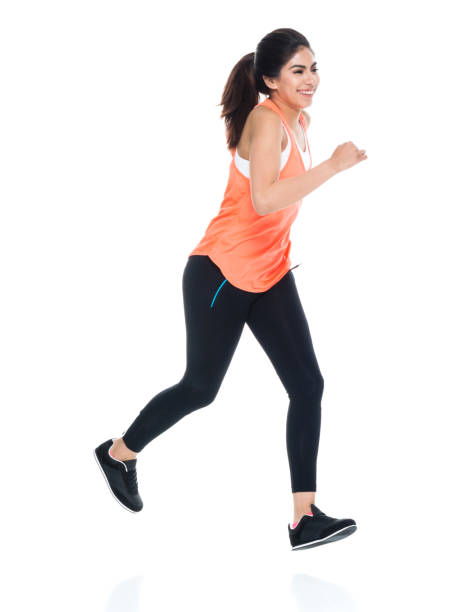 istock Woman in exercise clothes running 949359822