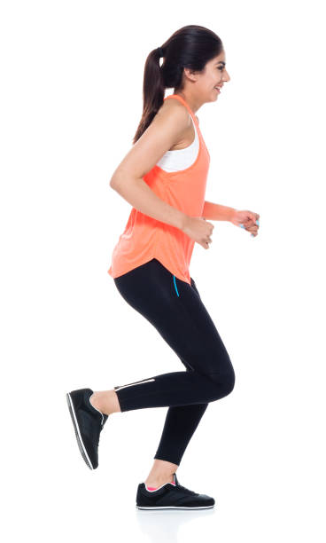 istock Woman in exercise clothes running 949359824
