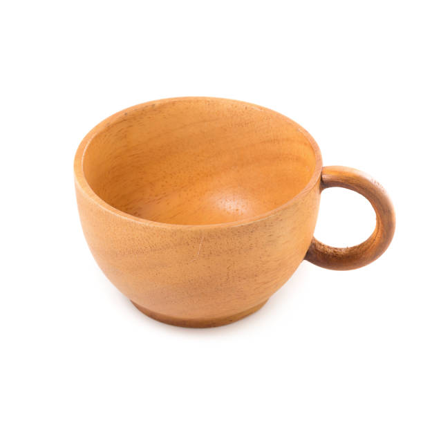 istock Wooden tea cup isolated on a white background 949360894