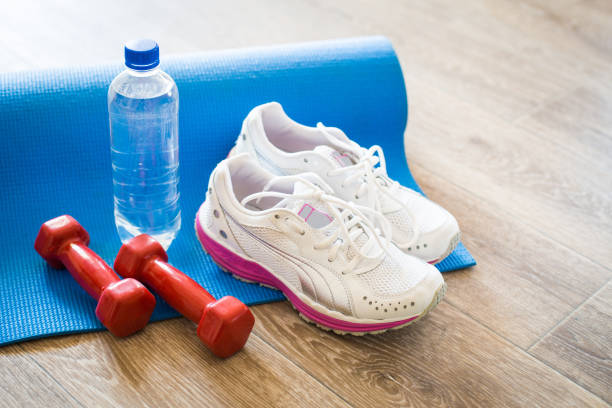 istock Set for sports activities on tiled floor 949361440