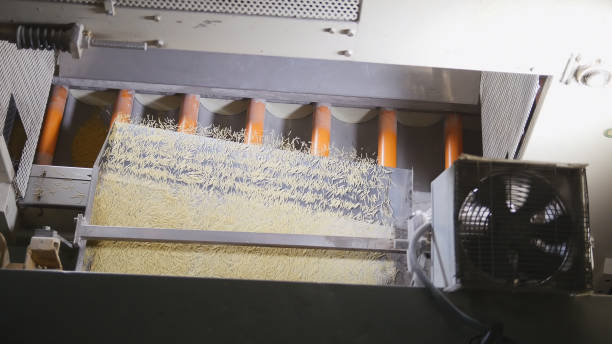 istock Macaroni factory production line - top view 949370068