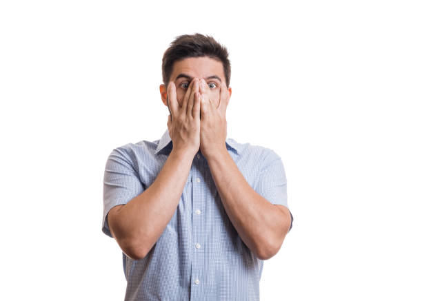 istock Man in shirt showing gestures and emotions 949370504