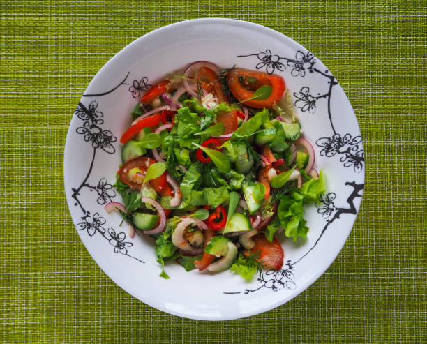 istock A light salad of vegetables. Summer salad. 949371630