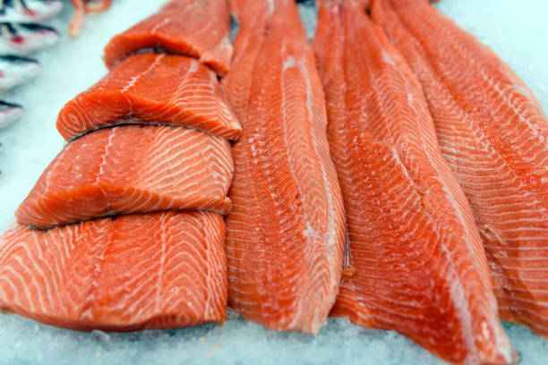 istock Fresh salmon fillet on ice 949381118