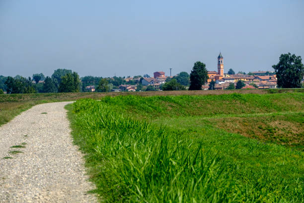Rural landscape along the Po cycle path Rural landscape along the Po cycle path near Orio Litta (Lodi, Lombardy, Italy) at summer lodi italy stock pictures, royalty-free photos & images