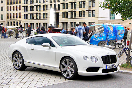 Berlin, Germany - September 12, 2013: Motor car Bentley Continental GT in the city street.