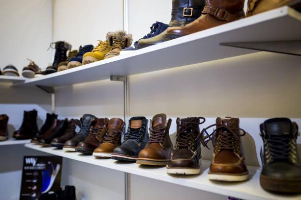 istock women's & men's shoes in a store 949397264