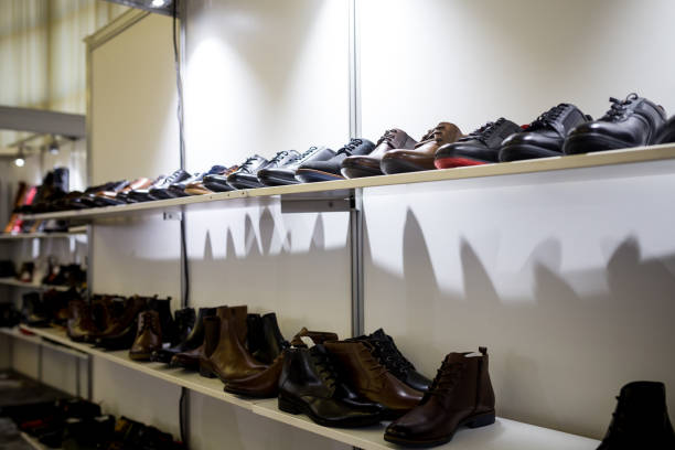 istock women's & men's shoes in a store 949397320