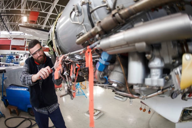 istock Aircraft mechanic in the hangar 949397346