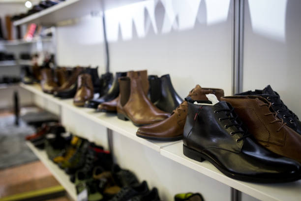 istock women's & men's shoes in a store 949397362