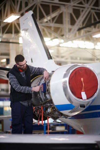 istock Aircraft mechanic in the hangar 949399576