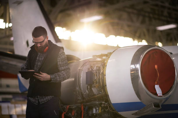 istock Aircraft mechanic in the hangar 949399596