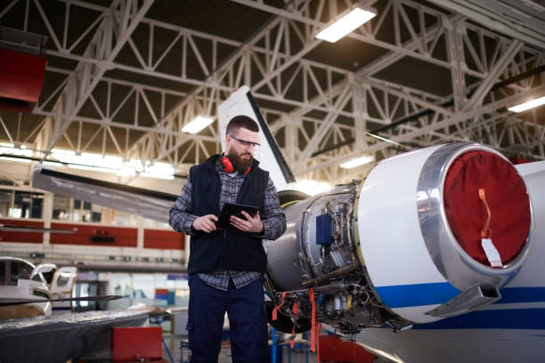 istock Aircraft mechanic in the hangar 949399800