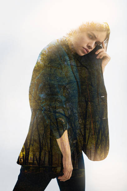 istock Gloomy person hiding and holding a black jacket 949405904