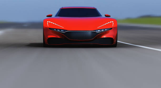 istock red car driving on a road 949406038