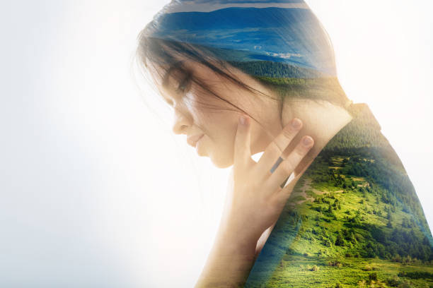 istock Worried person touching her neck while having a pain in it 949406382