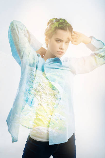 istock Fashion model frowning while posing for a photographer 949409074