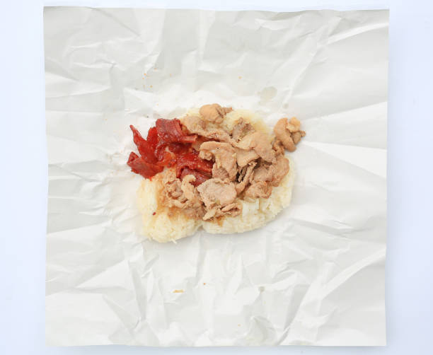 Pork fried with sticky rice wrap paper.