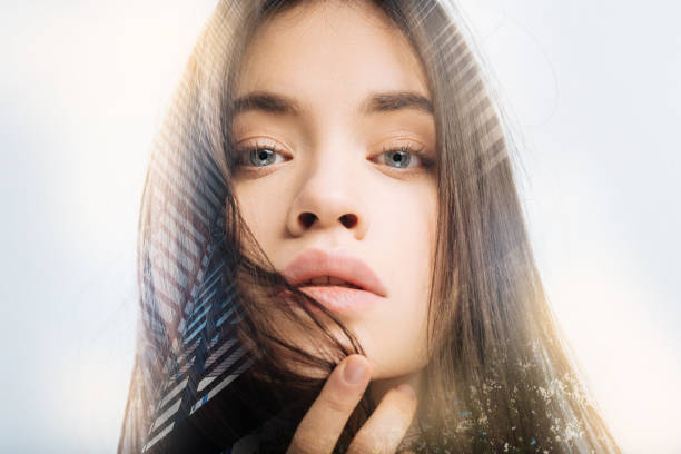 istock Amazing beauty blogger showing her lips while talking about lipsticks 949412360