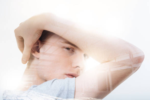 istock Young handsome man frowning and looking suspicious 949412696