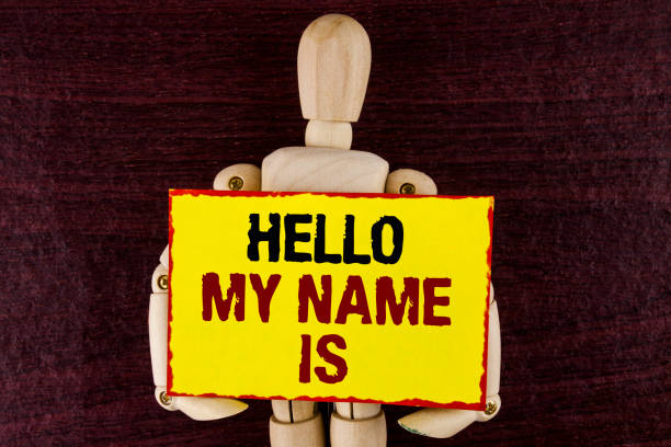 Word writing text Hello My Name Is. Business concept for meeting someone new Introduction Interview Presentation written Sticky note paper holding by Wooden Jointed Toy wooden background. texto de la escritura de palabra concepto hola mi nombre es negocio para alguien de la reunión nueva introducción presentación de entrevista escrita en papel de nota adhesiva sosteniendo por madera juguete articulado sobre fondo de madera.