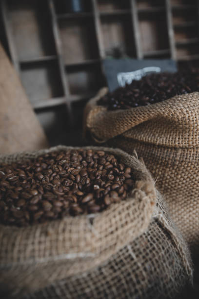 istock Coffee beans in vintage bag 949418352