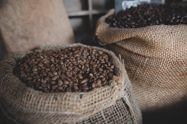 istock Coffee beans in vintage bag 949424038