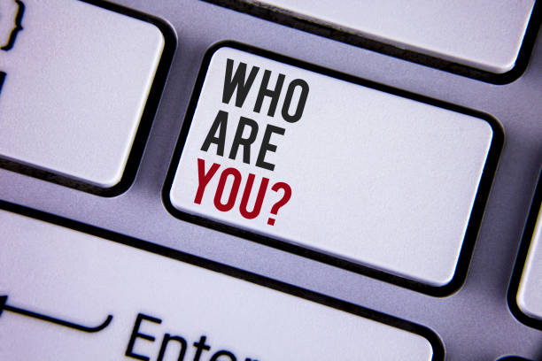 istock Writing note showing  Who Are You Question. Business photo showcasing Introduce or Identify Yourself Tell your Personal Story written on white keyboard key with copy space. Top view. 949429444
