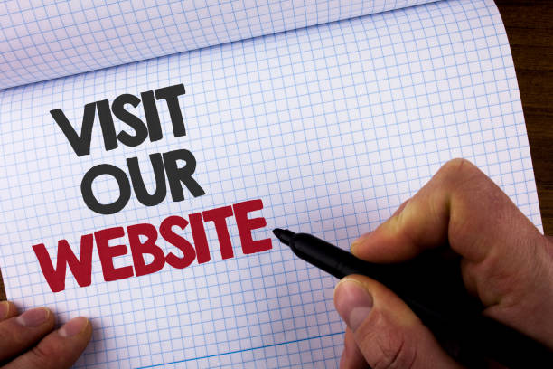 istock Writing note showing  Visit Our Website. Business photo showcasing Invitation Watch web page Link to Homepage Blog Internet written by Man on Notebook Book holding Marker on the wooden background 949429830